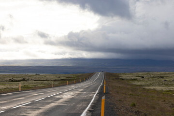 classic icelandic road under strorm