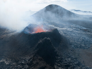 Fototapeta na wymiar Volcano spewing lava on its first day of eruption