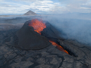 Volcano spewing lava on its first day of eruption