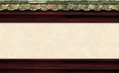 Stucco wall of traditional japanese house with oriental decorative roof tile. Oriental horizontal background. Mock up template. Copy space for text