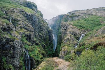 Fototapeta na wymiar Tourism scenic hiking trail near Vik to Icelandic waterfall