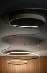 Circular pendant lights hanging from the ceiling