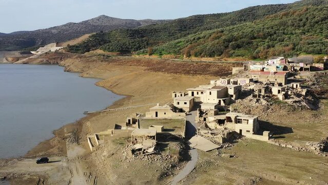 Sfentyli is an abandoned village which is sinking every winter when the dam of Aposelemi gets filled with water, Crete, Greece.