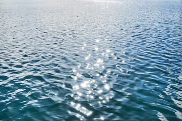 Sea waves and sun glare