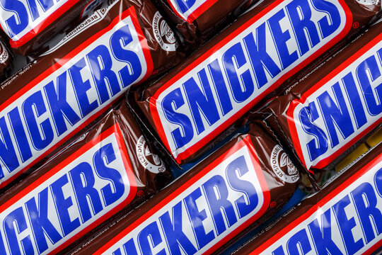 Snickers chocolate bars from Mars Inc. as a background