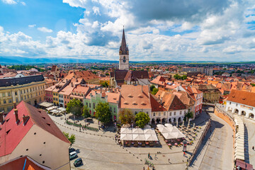 Small Square and Lutheran Cathedral in Sibiu, Transylvania, Romania - obrazy, fototapety, plakaty