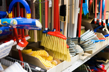 Large assortment of brushes for cleaning premises in the store. Trade in floor cleaning equipment