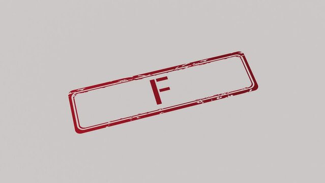 F Stamp pressing on a paper