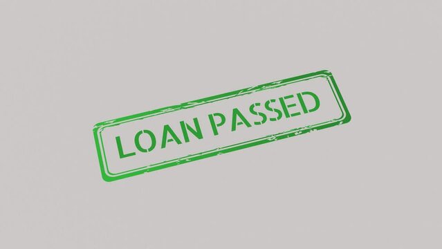 LOAN PASSED Stamp pressing on a paper