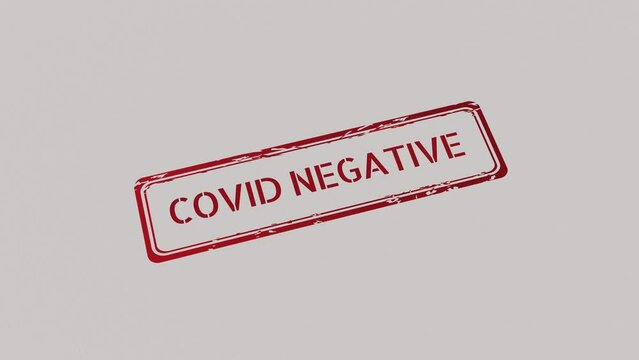 COVID NEGATIVE Stamp pressing on a paper