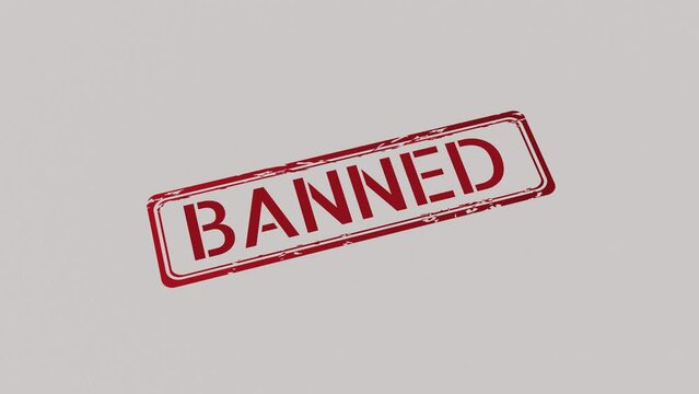 BANNED Stamp pressing on a paper
