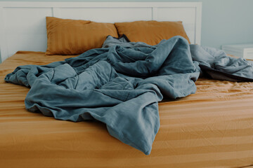 Close up image of bed with bed clothes and pillows. Housekeeping concept