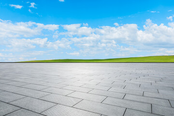 Empty square floor and green grass nature landscape under blue sky