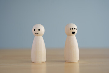 Opposite emotions smile and sad. Two human figure with happy face and unhappy expression. Satisfaction, Feedback, Mental health assessment, World mental health day, Different emotional concept.