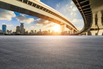 Foto auf Acrylglas Shanghai Asphalt road square and bridge with city skyline at sunset in Shanghai