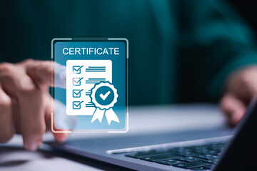 Business standard certificate concept. Businessman use laptop with virtual screen of Certified business documents. International standard certification of product.