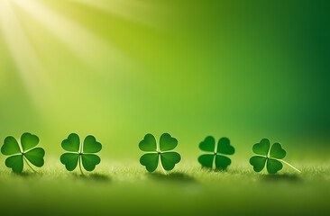 four leaf clover on a green background in sunlight. St. Patrick's day concept. copyspace