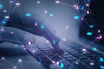 Close up of male hands using laptop computer with connected digital people team icons on dark blurry purple background. Digital network, online community and social media concept. Double exposure.