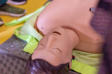 Close-up view of a CPR training mannequin used for demonstrating lifesaving techniques in a first...