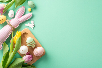 Easter magic in a top view photo! Wooden egg holder, bunny toy, and tulips arranged beautifully....