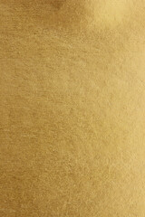 Gold paper texture background. gold wall background