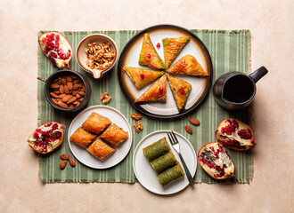 Top view of Sweet table with Baklava, layered pastry dessert made of filo pastry sheets, filled...