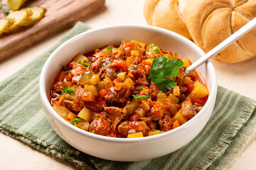 Azu dish, traditional Tatar meat stew made from beef with potatoes , tomato sauce and pickles.