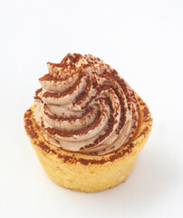 Single bite size tiramisu tartlet isolated on white with selective focus and copy space