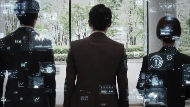 前進するビジネスパーソンのグループの後ろ姿とデジタルテクノロジー