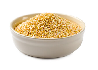 Raw quinoa in bowl isolated on white