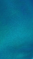 Paint glitter fluid. Blur vibrant blue purple color sparkling oil ink emulsion flow opener motion abstract art background.