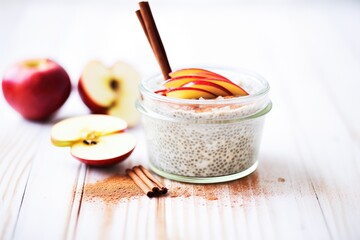 Fototapeta premium chia pudding with a cinnamon stick and apple slices