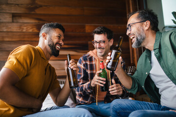 Best friends togehter, drinking beer and talking. Concept of male friendship, bromance.