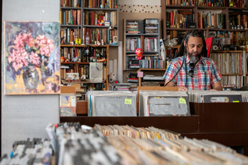 Man seen searching through vinyl records