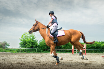  woman riding a horse