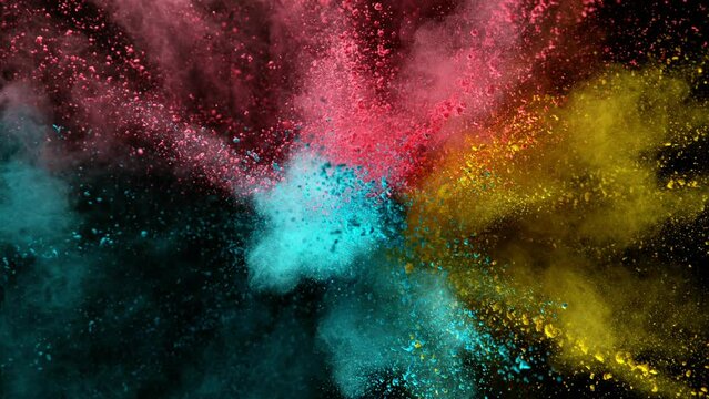 Super Slow Motion of Colored Powder Explosion. Filmed on High Speed Cinema Camera, 1000fps. Isolated on Black Background.