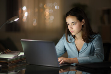 Freelancer woman working in the night at home