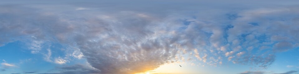 Bright sunset sky panorama with glowing red pink Cumulus clouds. HDR 360 seamless spherical panorama. Sky dome or zenith in 3D, sky replacement for aerial drone panoramas. Climate and weather change.