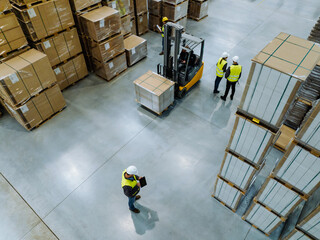 Top view of workers modern warehouse storage of retail shop, large factory workshop space....