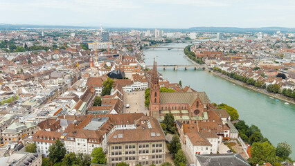 Fototapeta na wymiar Basel, Switzerland. Basel Cathedral. Basel is a city on the Rhine River in northwestern Switzerland, near the borders with France and Germany, Aerial View