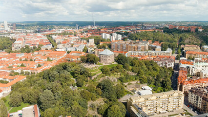 Fototapeta na wymiar Gothenburg, Sweden. Skansen Kronan - A fortress on a hill with panoramic views of the city. Panorama of the city. Summer day. Cloudy weather, Aerial View