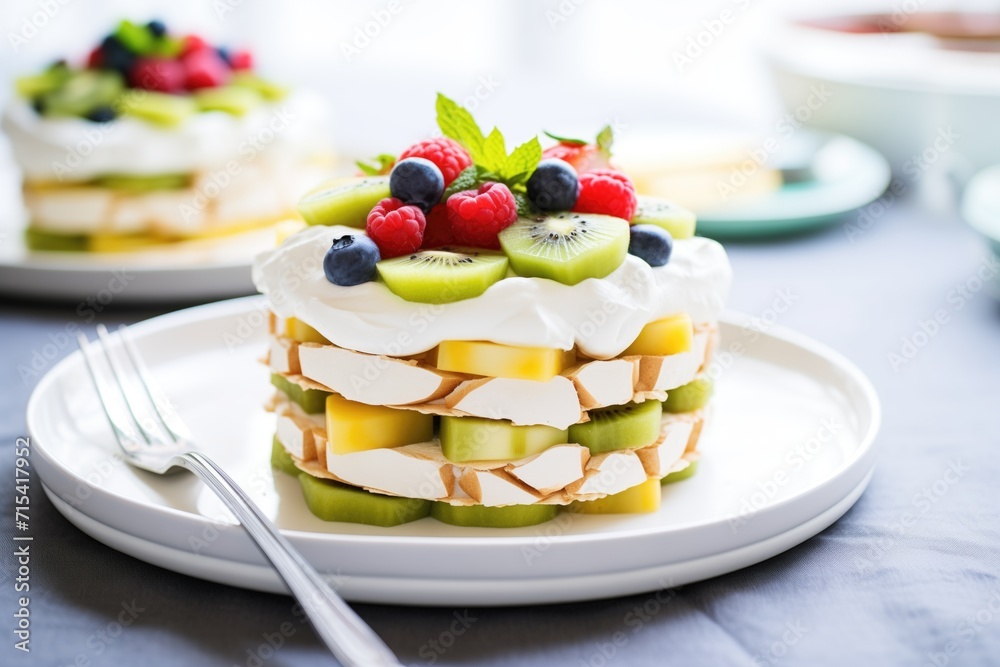 Wall mural side angle view of layered pavlova with kiwi slices