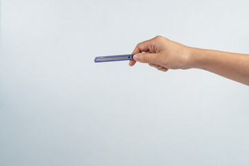 Hand Holding cutter on white Background