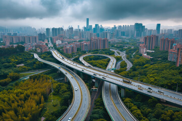 Fototapeta na wymiar Aerial view of highway and overpass in city on a cloudy day 