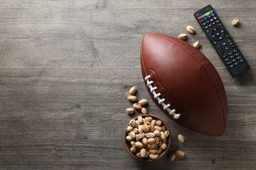 Bowl of popcorn with rugby ball, Super Bowl concept