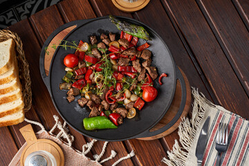 Top view photo of Lamb dish cooked with vegetables