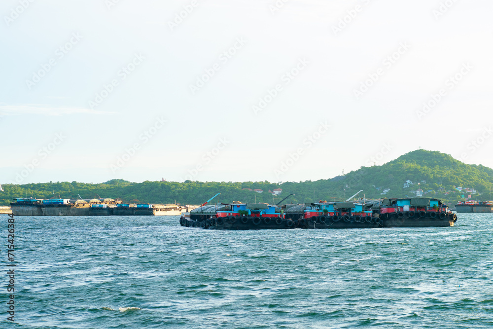 Wall mural shipping boat transport on sea bay shipping port city background