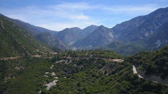 4K Drone Shot Sweeping Over Mountain Hills and Scenic Valley