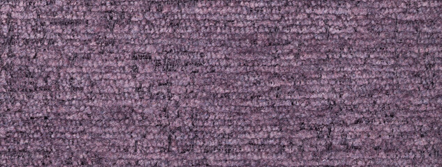 Texture of velvet dark violet background from soft upholstery textile material, macro. Abstract velour purple fabric