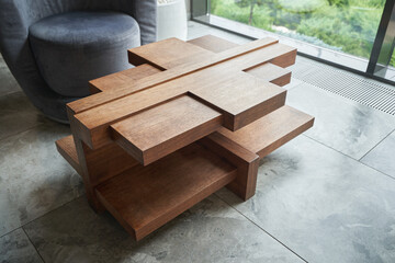 Coffee table made of pieces of wood in a modern style